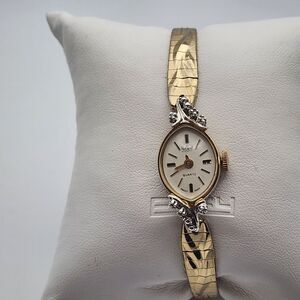 Vintage Paul Maret Gold Tone Watch with 6 Diamonds